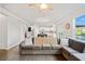 Open-concept living area showcasing hardwood floors and ample natural light at 273 Amylou Cir, Woodstock, GA 30188
