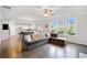 Open-concept living area showcasing hardwood floors and ample natural light at 273 Amylou Cir, Woodstock, GA 30188