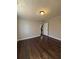 Bedroom with hardwood floors and neutral paint, creating a peaceful and inviting space at 1027 N Born Rd, Stone Mountain, GA 30088