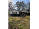 Well-maintained front yard with lush greenery enhancing curb appeal at 1027 N Born Rd, Stone Mountain, GA 30088