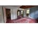 View of a distressed living room with peeling paint and damaged walls at 1182 Bronx Nw St, Atlanta, GA 30314