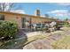 Backyard featuring an exterior patio, patio furniture, green grass, and access to the house at 1254 Renee Dr, Decatur, GA 30035