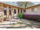 Charming entrance way with beautiful stonework, mature landscaping and brick accents at 1254 Renee Dr, Decatur, GA 30035