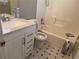 Updated bathroom features a bright vanity with modern fixtures and a tiled shower-tub combo at 1848 San Gabriel Ave, Decatur, GA 30032