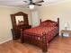 Comfortable bedroom with wood furniture, ceiling fan, and neutral-colored walls at 1848 San Gabriel Ave, Decatur, GA 30032