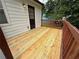 New wooden deck offers outdoor living space and complements the home's design at 1848 San Gabriel Ave, Decatur, GA 30032