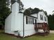 Charming split-level home with a wood deck, chimney, and well-maintained landscaping with fresh mulch at 1848 San Gabriel Ave, Decatur, GA 30032
