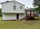 Two-story home with a deck, siding, and a well-maintained lawn at 1848 San Gabriel Ave, Decatur, GA 30032