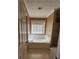 Bathroom showcasing a soaking tub beneath a window, accompanied by a shower stall at 210 Vintage Dr, Covington, GA 30014