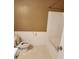 Bathroom featuring a toilet, with a shower/tub combo, and brown walls at 210 Vintage Dr, Covington, GA 30014