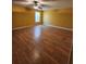 Bedroom with hardwood floors, neutral walls, and a ceiling fan at 210 Vintage Dr, Covington, GA 30014