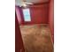 Bedroom with red walls, a window with natural light, and carpet floors at 210 Vintage Dr, Covington, GA 30014