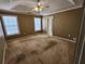 Spacious bedroom with a ceiling fan and two windows bringing in lots of natural light at 210 Vintage Dr, Covington, GA 30014