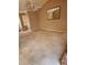 Large living room with ceiling fan, lots of light, and neutral colored walls at 210 Vintage Dr, Covington, GA 30014