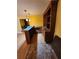 Wet bar featuring a microwave and plenty of shelving at 210 Vintage Dr, Covington, GA 30014