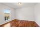 Bright bedroom features wood floors and a large window at 4740 Union Hill Rd, Canton, GA 30115