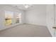 Bedroom with large windows offering natural light and neutral carpet at 4740 Union Hill Rd, Canton, GA 30115