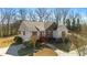 Charming single-Gathering home with a stone accent wall, surrounded by mature trees at 4740 Union Hill Rd, Canton, GA 30115