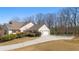 Spacious two-car garage and well-manicured lawn complement this home's exterior at 4740 Union Hill Rd, Canton, GA 30115