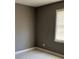 Bedroom with gray walls and a window at 1655 Cherry Hill Sw Rd, Conyers, GA 30094