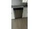 Stainless steel dishwasher and white cabinets at 1655 Cherry Hill Sw Rd, Conyers, GA 30094