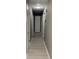 Hallway with gray walls and white trim at 1655 Cherry Hill Sw Rd, Conyers, GA 30094