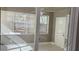 This sunroom features bright windows, neutral paint, ceiling fan, and tile flooring at 1655 Cherry Hill Sw Rd, Conyers, GA 30094