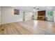 Spacious living room featuring a fireplace, natural light, and hardwood flooring at 2415 Wales Dr, Austell, GA 30106