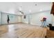 Open-concept living area with hardwood floors and neutral tones, providing a blank canvas for your design dreams at 2415 Wales Dr, Austell, GA 30106
