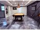 Finished basement with pool table, dart board, stylish floors, and modern wall design with large-screen TV at 410 Spring Lake Hls, Canton, GA 30114