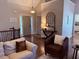 Inviting foyer with hardwood floors, console table, and an arched decorative mirror at 410 Spring Lake Hls, Canton, GA 30114