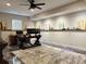 Spacious office space with natural light, wooden desk, and built in shelving at 410 Spring Lake Hls, Canton, GA 30114