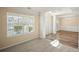 Inviting entryway boasts natural light and a seamless transition to a formal dining space at 63 Shadowhill Ct, Loganville, GA 30052