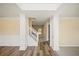 Spacious entryway features plush carpeting, white pillars, fresh paint, and lots of natural light at 63 Shadowhill Ct, Loganville, GA 30052