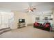 Inviting living room featuring a comfortable seating area and a staircase at 63 Shadowhill Ct, Loganville, GA 30052