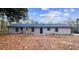 View of the back of the home at 1463 Rockmoor Ct, Stone Mountain, GA 30088