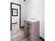 Updated bathroom featuring a modern vanity and sink at 1463 Rockmoor Ct, Stone Mountain, GA 30088