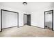 Bright bedroom with neutral carpet, white walls, and easy access to a full bathroom at 1463 Rockmoor Ct, Stone Mountain, GA 30088