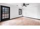 Bright bedroom with a ceiling fan and neutral finishes at 1463 Rockmoor Ct, Stone Mountain, GA 30088