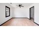 Cozy bedroom with natural light, wood-look flooring and a ceiling fan at 1463 Rockmoor Ct, Stone Mountain, GA 30088