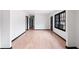 Spacious and inviting living room featuring wood-look flooring and neutral walls at 1463 Rockmoor Ct, Stone Mountain, GA 30088
