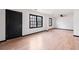 Bright and inviting living room with wood-look flooring and modern touches at 1463 Rockmoor Ct, Stone Mountain, GA 30088
