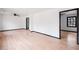 Open-concept living area featuring new flooring and a ceiling fan at 1463 Rockmoor Ct, Stone Mountain, GA 30088
