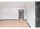 Bright and spacious living room featuring new flooring and painted trim at 1463 Rockmoor Ct, Stone Mountain, GA 30088