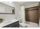 Modern bathroom with tile shower, vanity, and stylish fixtures at 3776 Bromolow Trl, Lawrenceville, GA 30044