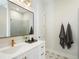 This bathroom features sleek white countertops, modern fixtures, and beautifully patterned tile flooring at 921 Hughley Circle Se # 66, Atlanta, GA 30316