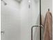 This bathroom features a glass shower with white subway tile and a large towel at 921 Hughley Circle Se # 66, Atlanta, GA 30316