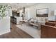 Open living area with hardwood floors, stylish decor, and a view into a modern kitchen at 921 Hughley Circle Se # 66, Atlanta, GA 30316