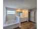 Modern bathroom with tub, window, hard wood floors, and white vanity with double sinks at 2664 Mourning Dove Drive( Lot 38), Grayson, GA 30017