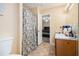 This bathroom features a vanity, toilet, and shower at 321 Oak Landing Cir, Douglasville, GA 30134